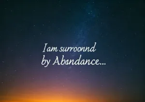Text reading I am surroond by Abandance... is overlaid on a background of a starry night sky with a hint of orange light near the horizon. The words contain spelling errors.