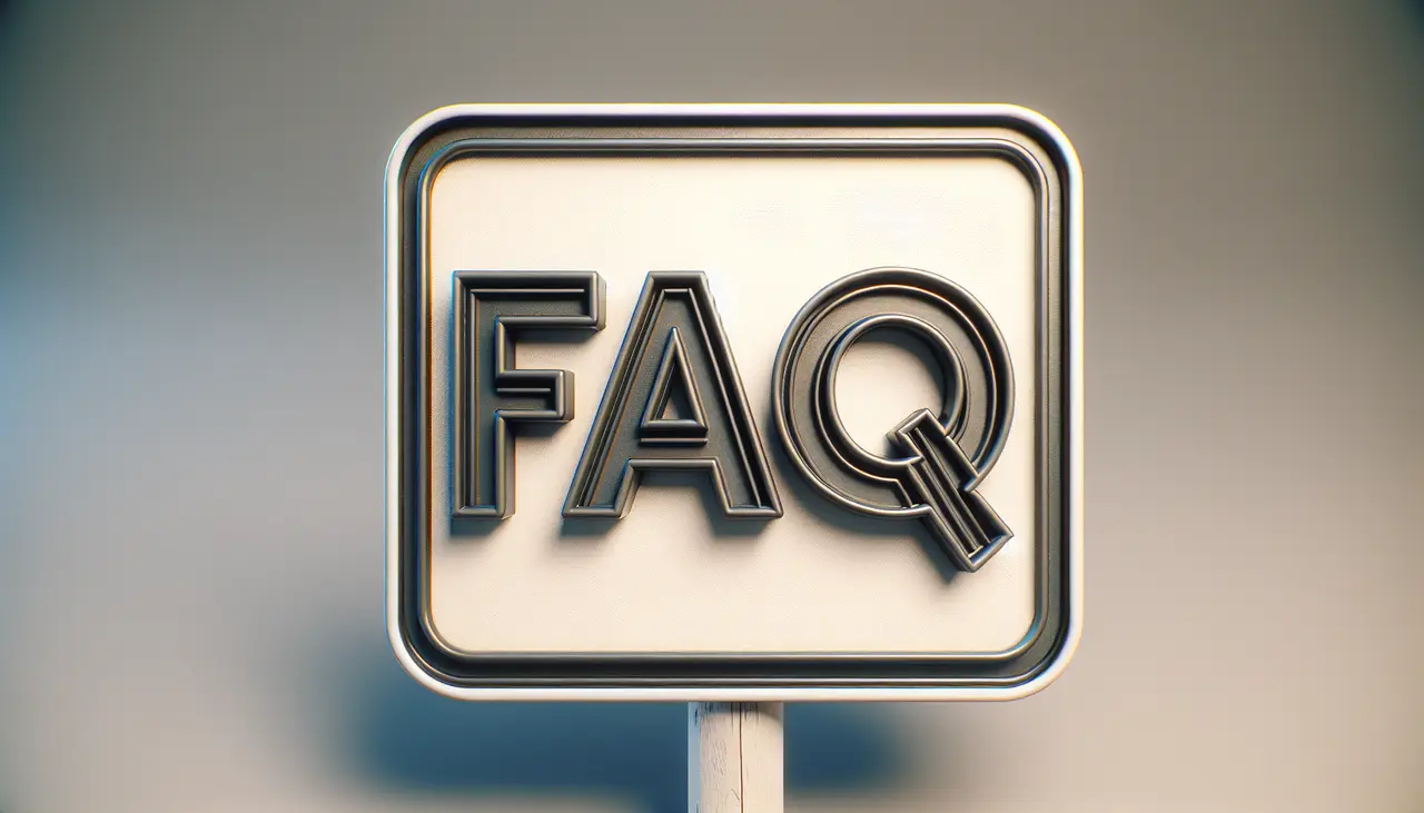 A sign with the bold letters FAQ in black on a white background, framed by a silver border, indicating frequently asked questions.