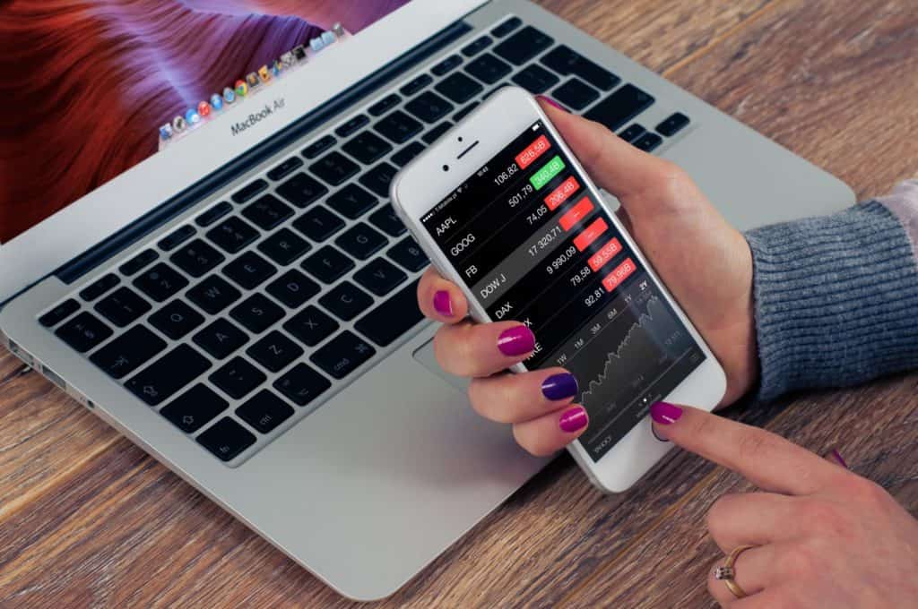 looking at stock market on phone (Investing 101)