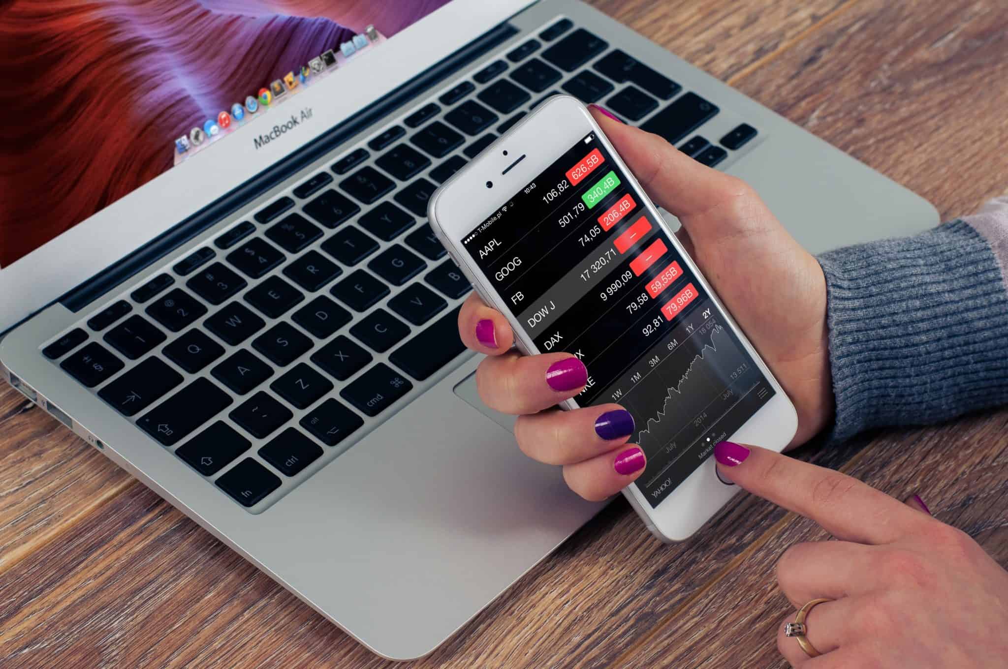 looking at stock market on phone (Investing 101)